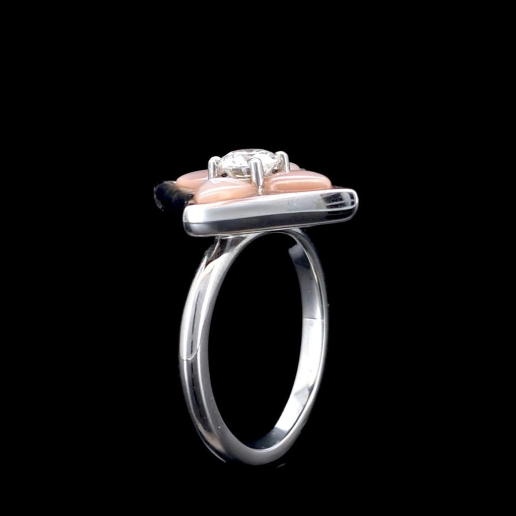 Impimo 0.50 CT moissanite and pink mother of pearl ring - front view with the 0.50 CT centre stone set against the pink mother of pearl frame.
