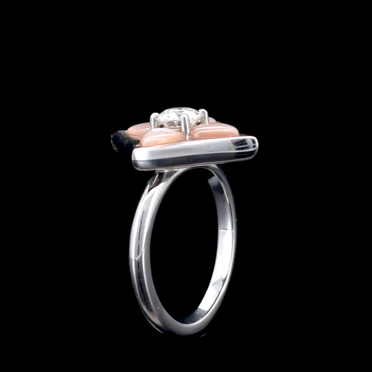Impimo 0.50 CT moissanite and pink mother of pearl ring - front view with the 0.50 CT centre stone set against the pink mother of pearl frame.