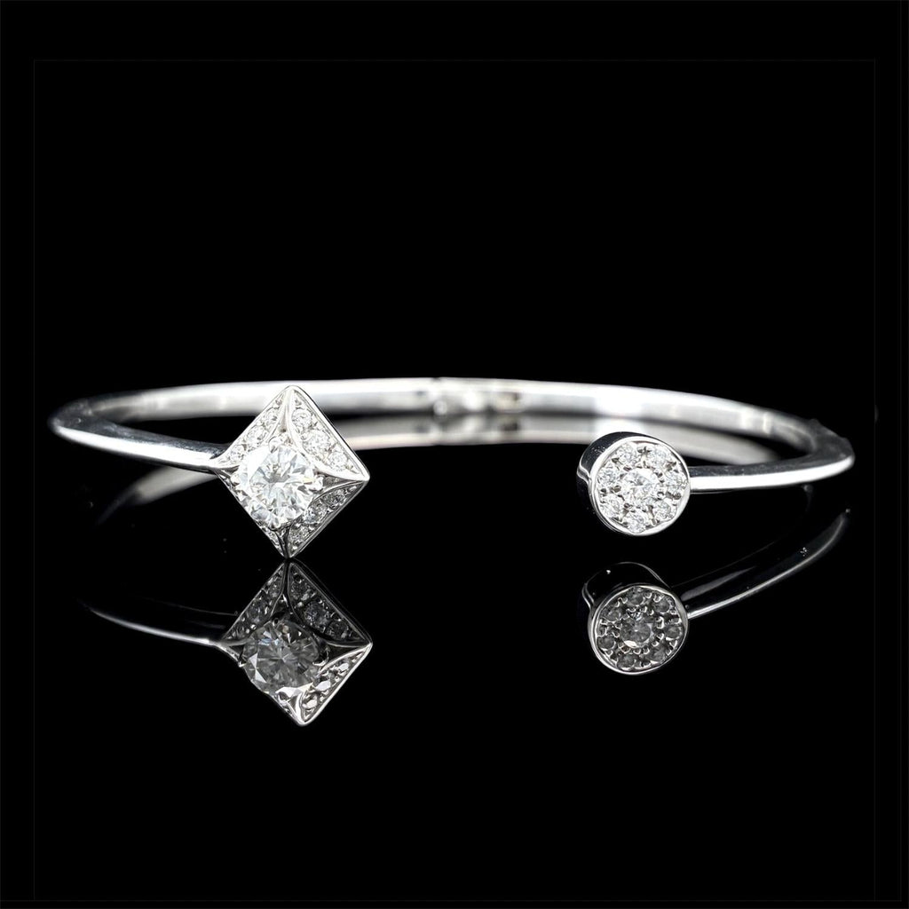 Impimo moissanite round centre bracelet, 925 sterling silver with 18K white gold plating - shown at an angle with the round centre stone and the moissanite-set band.