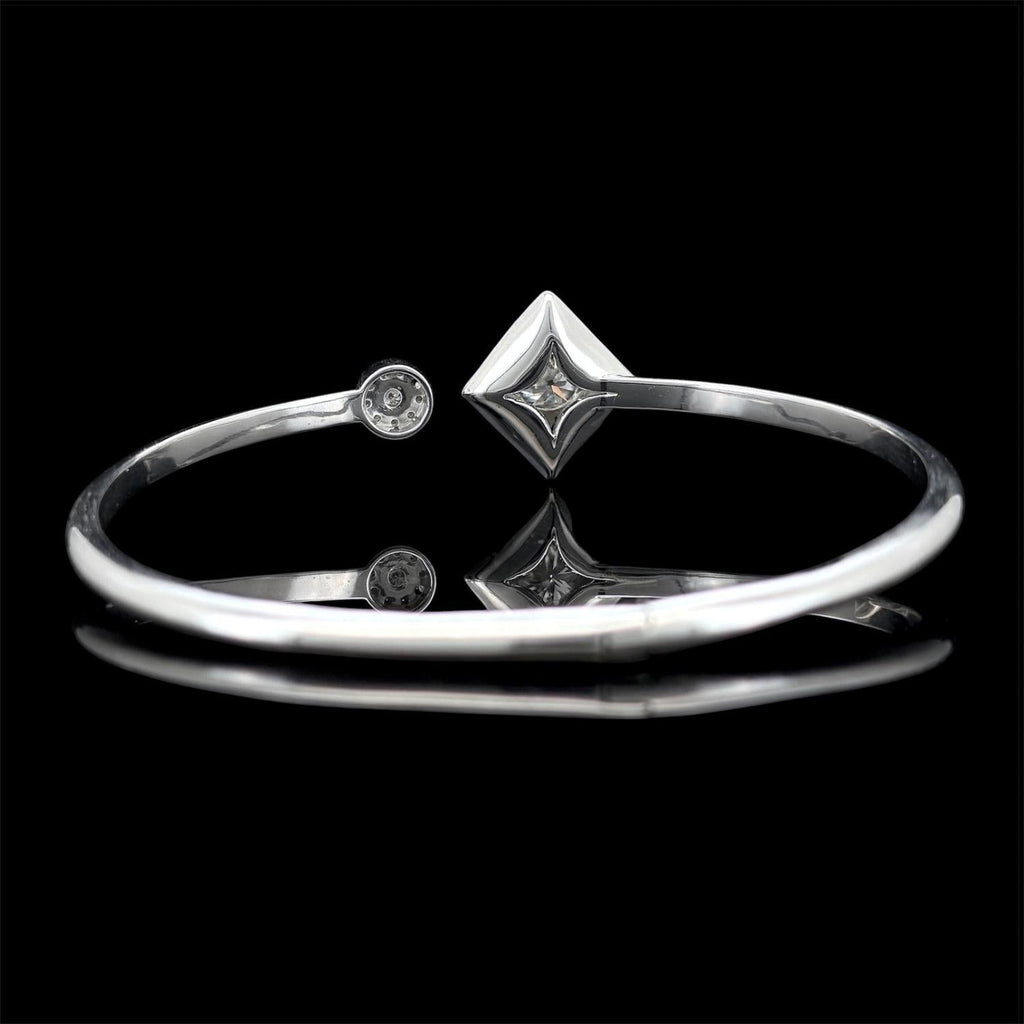 Impimo moissanite round centre bracelet - angled view with the round centre stone facing camera and the moissanite band curving away.