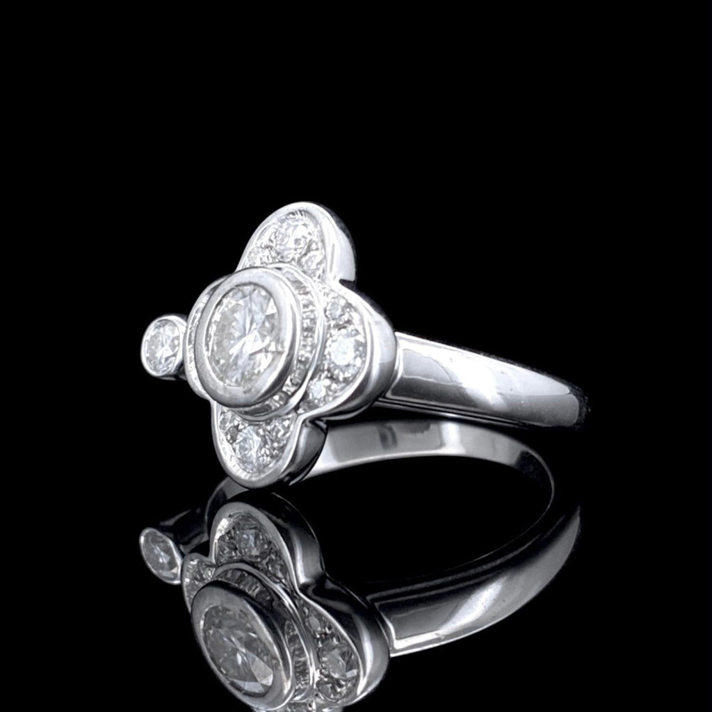 Impimo 0.90 CT moissanite vintage ring - three-quarter view with the setting and the tapered band in profile.