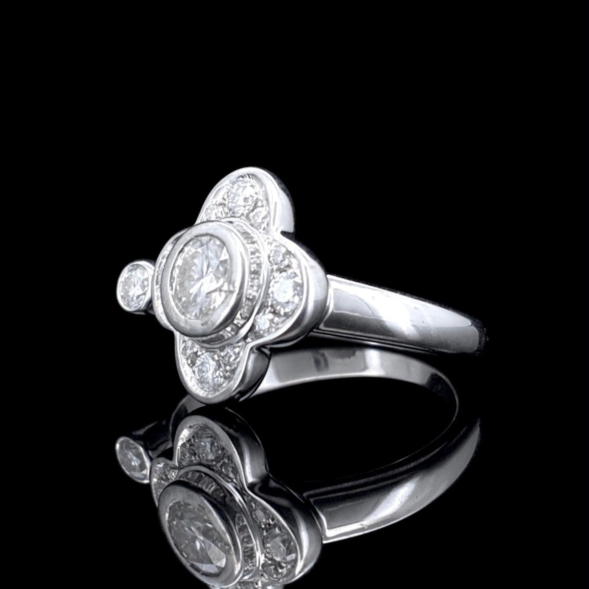 Impimo 0.90 CT moissanite vintage ring - three-quarter view with the setting and the tapered band in profile.