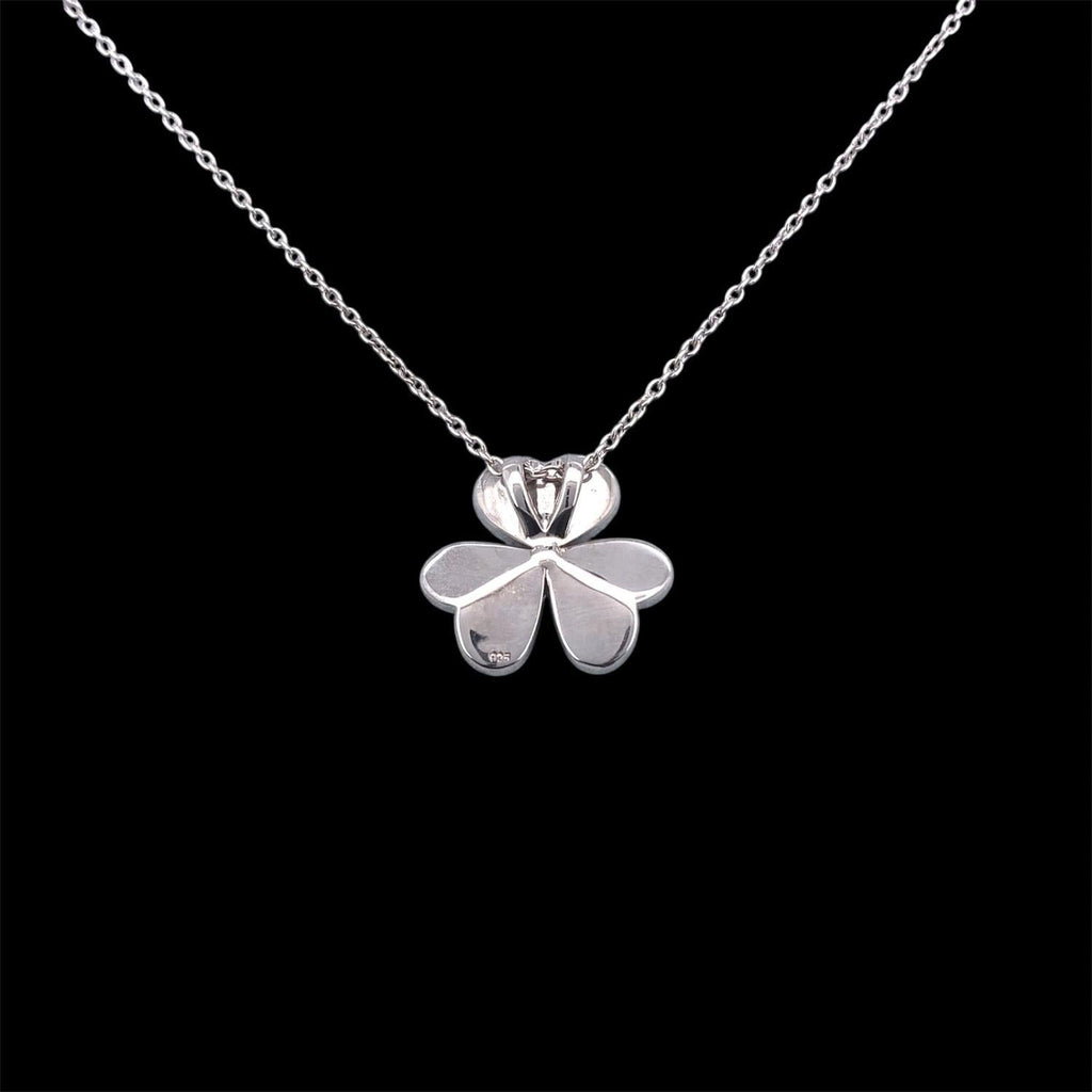 Impimo mother of pearl and moissanite flower pendant necklace - the hand-carved shell flower pendant with its raised round moissanite centre, on the chain.