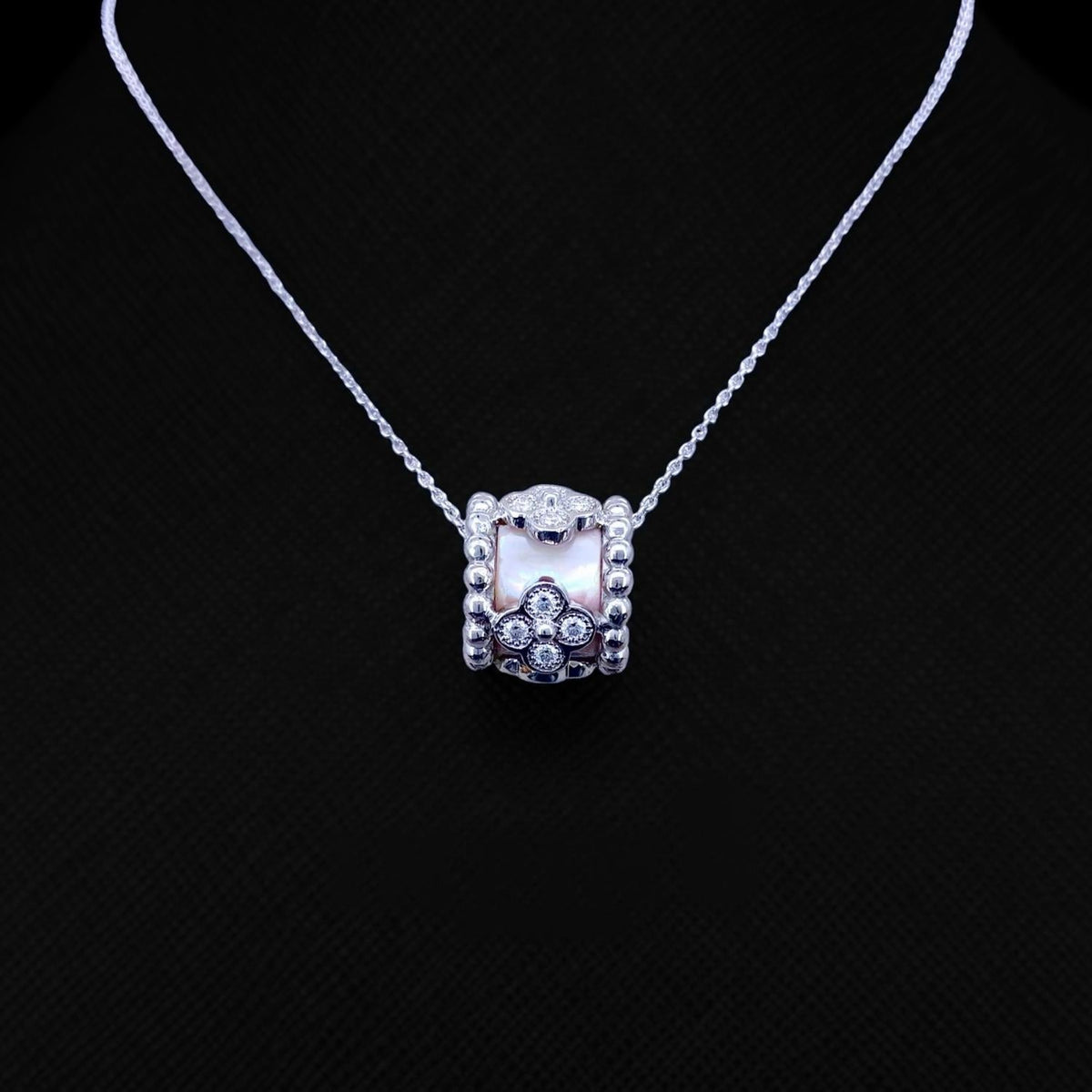 Impimo pink mother of pearl and moissanite flower motif slider pendant