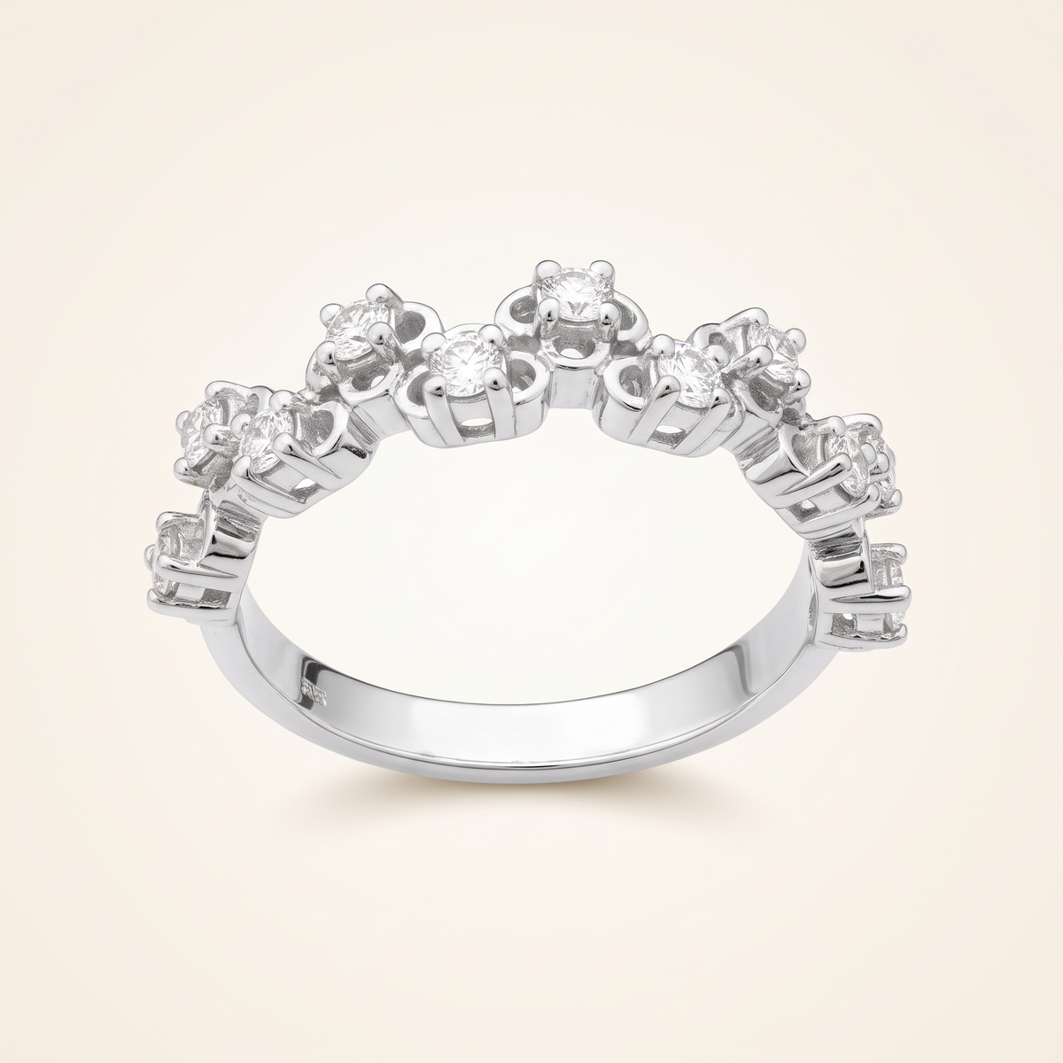 0.5 CT lab-grown diamond round cut ring in 925 sterling silver with 18K white gold plating, on a light ivory background