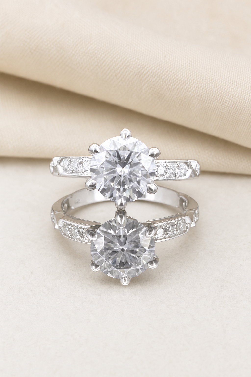 Impimo 1/2 CT Moissanite Round Cut Ring with Accent Stones - 925 Silver 18K White Gold | display view on ivory linen