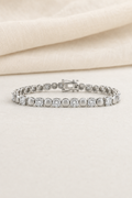 Impimo 8 CT (0.5 CT) Moissanite Round Cut Bracelet - 925 Sterling Silver with 18K White Gold Plating | display view on ivory linen
