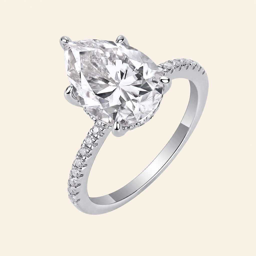 Impimo 4 CT Moissanite Pear Cut Ring - 925 Sterling Silver with 18K White Gold Plating | packshot on ivory