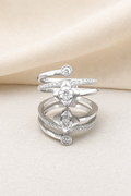 Impimo 0.50 CT Moissanite Bypass Twist Ring - 925 Sterling Silver 18K White Gold | display view on ivory linen