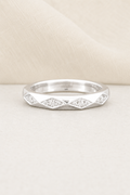 Impimo 0.35 CT Moissanite Round Eternity Ring - 925 Sterling Silver 18K White Gold | display view on ivory linen