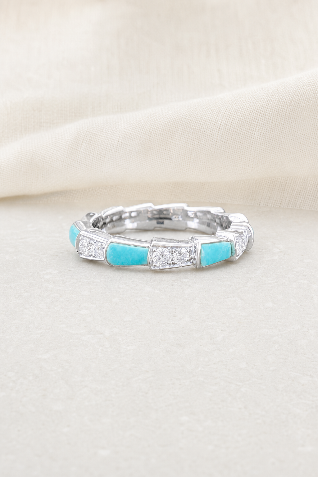 Impimo 0.35 CT Moissanite & Turquoise Geometric Ring - 925 Sterling Silver 18K White Gold | display view on ivory linen
