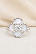 Impimo 0.50 CT Moissanite Floral Ring with Natural Mother-of-Pearl - 925 Sterling Silver 18K White Gold | display view on ivory linen