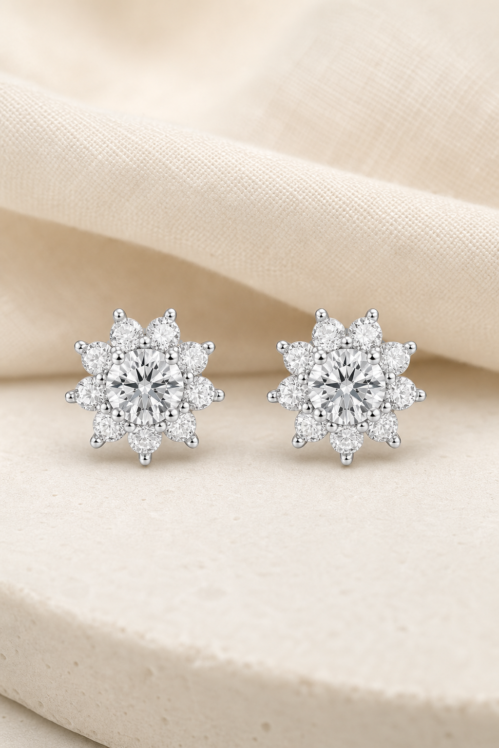 Impimo 1/2 CT (Total) Moissanite Round Cut Earrings - 925 Sterling Silver with 18K White Gold Plating | display view on ivory linen