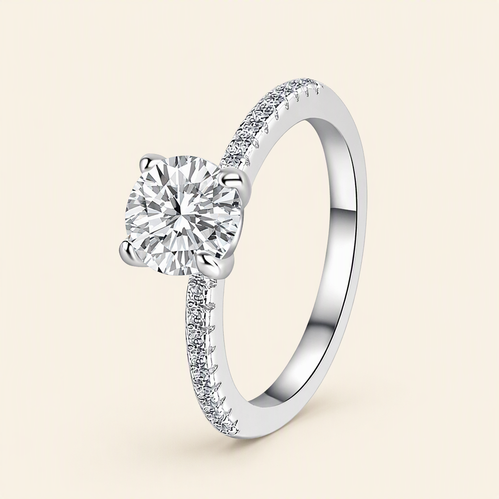 Impimo 0.5/1/2/3/5 CT Moissanite Round Cut Ring - 925 Sterling Silver with 18K White Gold Plating | packshot on ivory