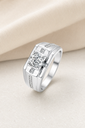 Impimo 1/2 CT Moissanite Round Cut Ring - Cross Accent Band - 925 Sterling Silver with 18K White Gold Plating | display view on ivory linen