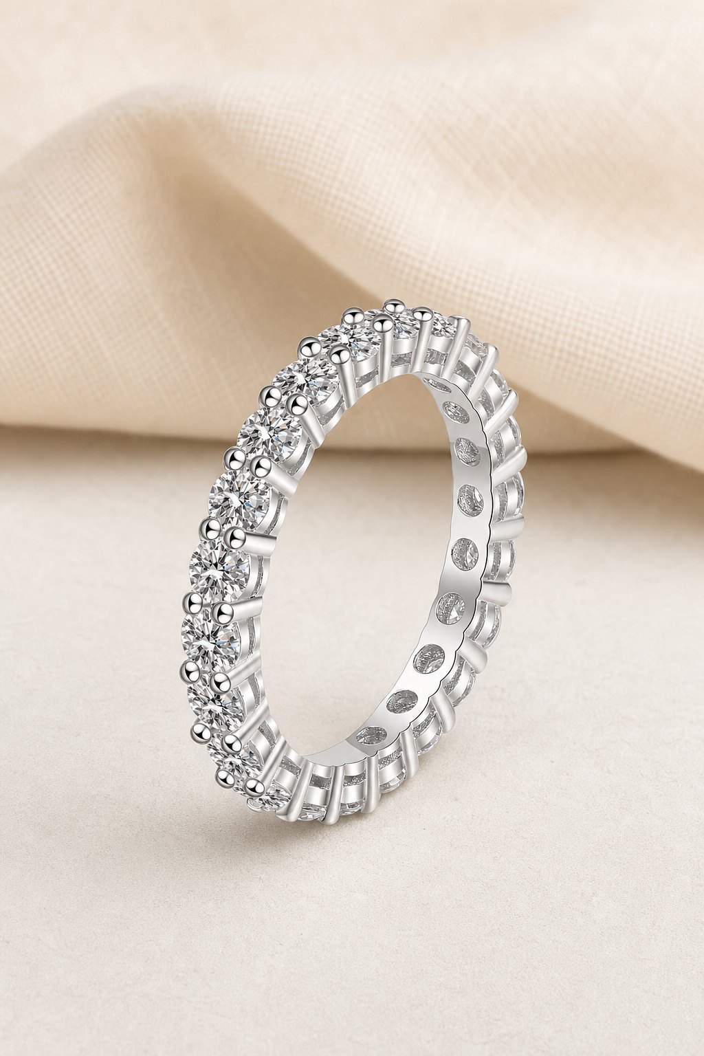 Impimo 2.2 CT (Total) Moissanite Round Cut Eternity Ring - 925 Sterling Silver with 18K White Gold Plating | display view on ivory linen