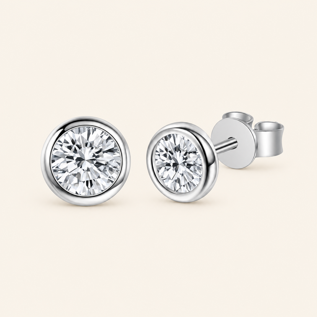 Impimo 0.6/1/2 CT Moissanite Round Cut Earrings - 925 Sterling Silver with 18K White Gold Plating | packshot on ivory