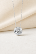 Impimo 1/2 CT Moissanite Round Cut Pendant - 925 Sterling Silver with 18K White Gold Plating | display view on ivory linen