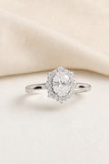 Impimo 1CT Moissanite Oval Cut Ring - 925 Sterling Silver with 18K White Gold Plating | display view on ivory linen