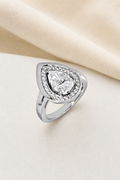 Impimo 3 CT Moissanite Pear Cut Ring - 925 Sterling Silver with 18K White Gold Plating | display view on ivory linen