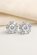 Impimo Moissanite Round Cut Earrings - 925 Sterling Silver with 18K White Gold Plating | display view on ivory linen
