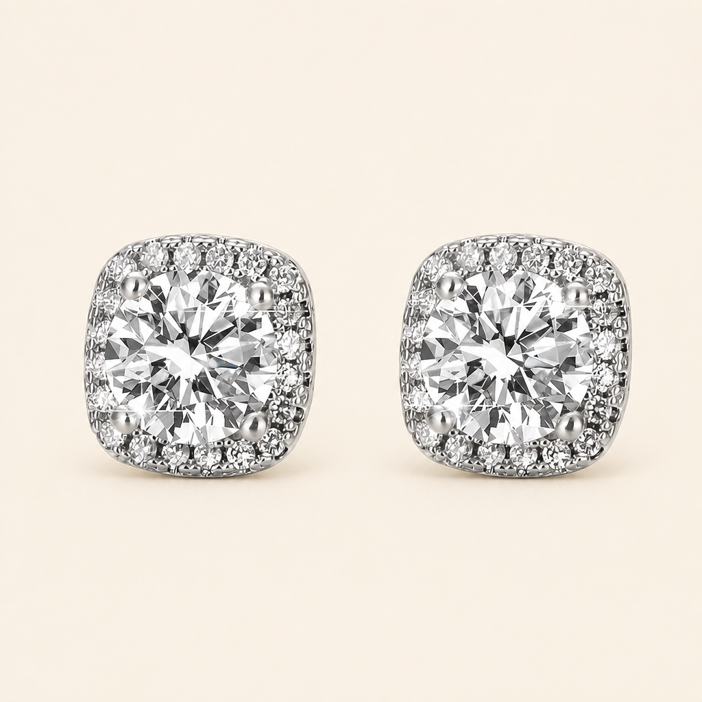 Impimo 1/2 CT (Pair) Moissanite Round Cut Earrings - Cushion Halo Stud - 925 Sterling Silver with 18K White Gold Plating | packshot on ivory