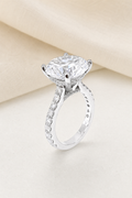 Impimo 10 CT Moissanite Round Cut Ring - Cathedral Pavé Solitaire - 925 Sterling Silver with 18K White Gold Plating | display view on ivory linen