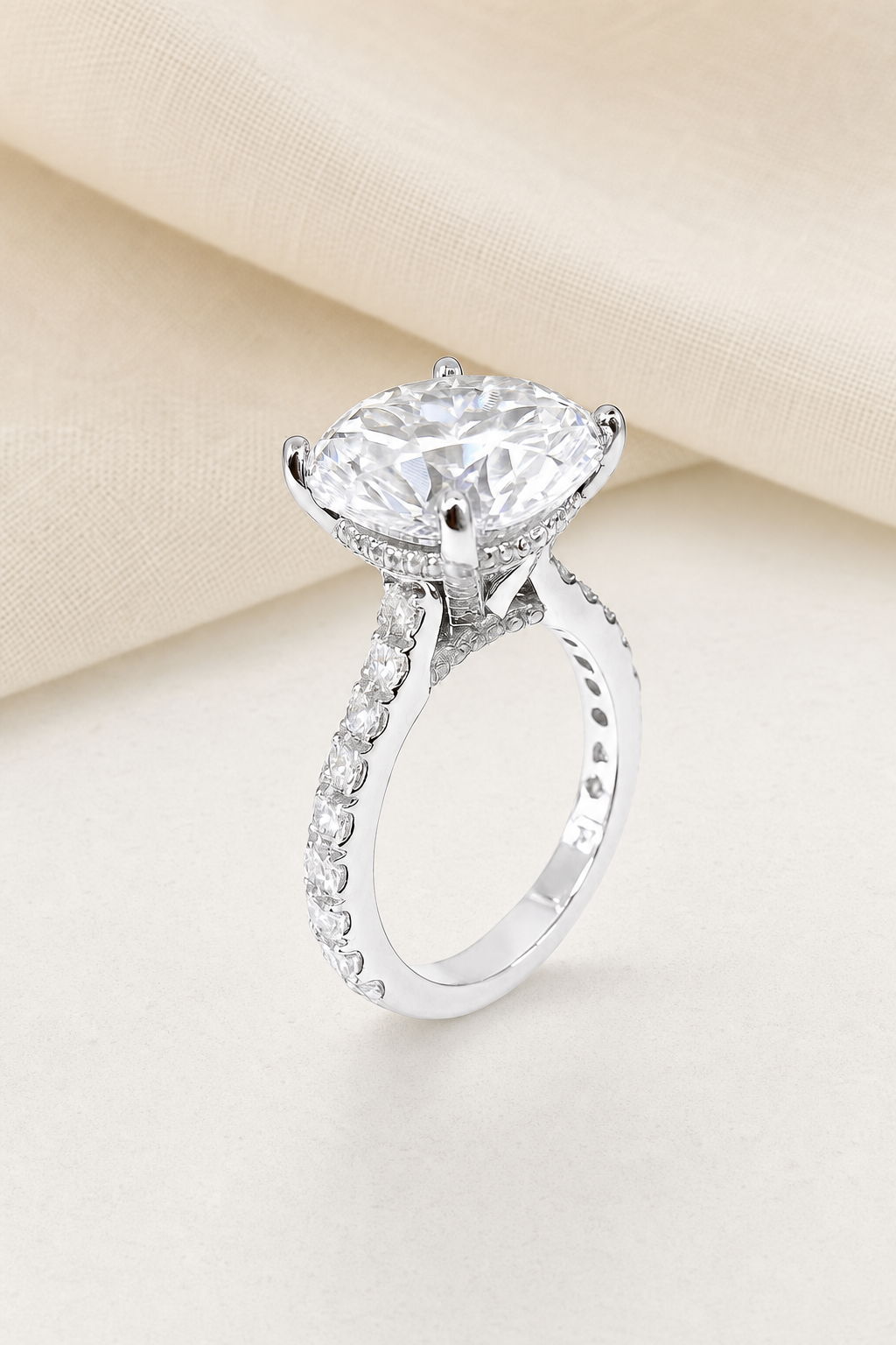 Impimo 10 CT Moissanite Round Cut Ring - Cathedral Pavé Solitaire - 925 Sterling Silver with 18K White Gold Plating | display view on ivory linen