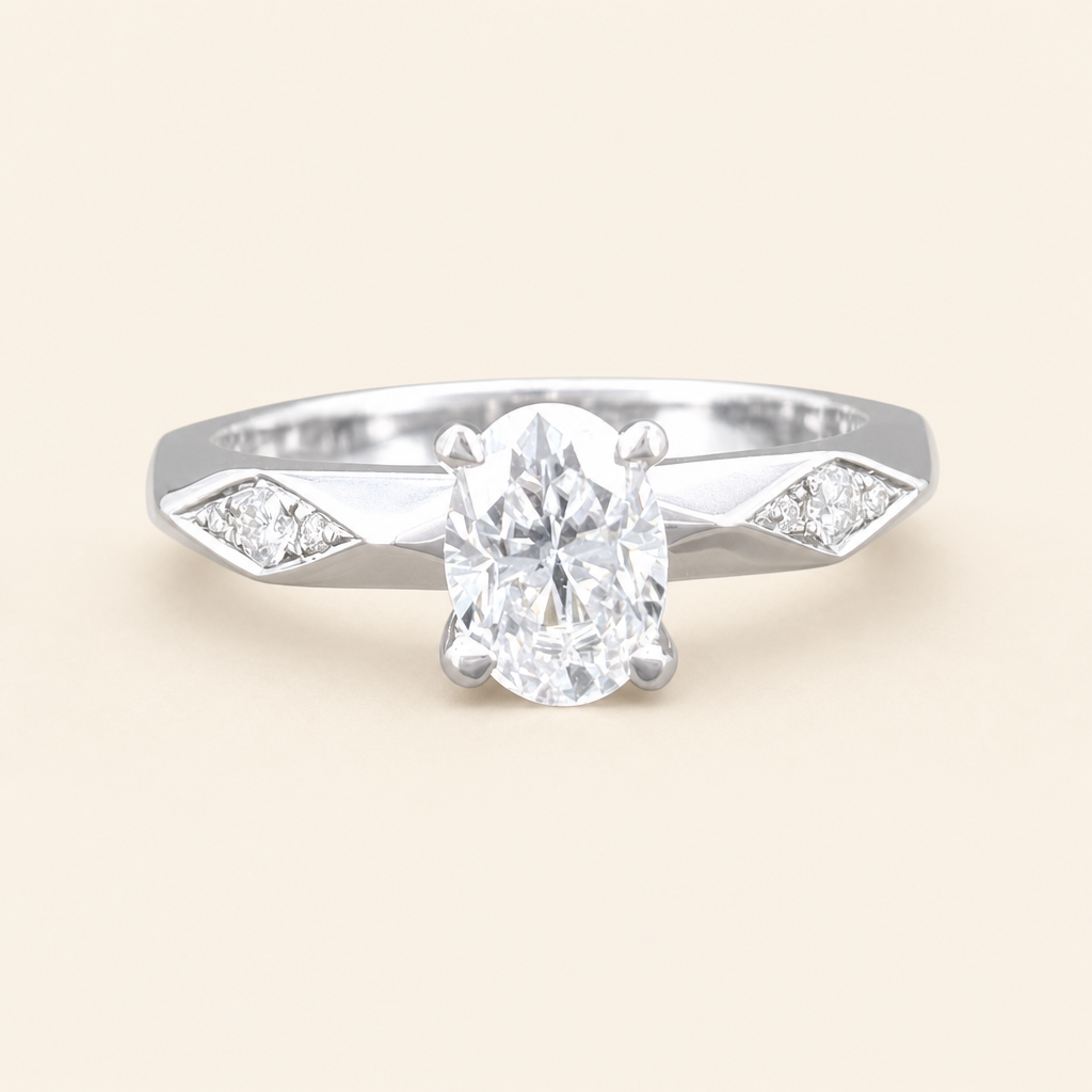 Impimo 1-2 CT Moissanite Oval Solitaire Ring with 0.20 CT Shoulder Stones - 925 Sterling Silver 18K White Gold | packshot on ivory
