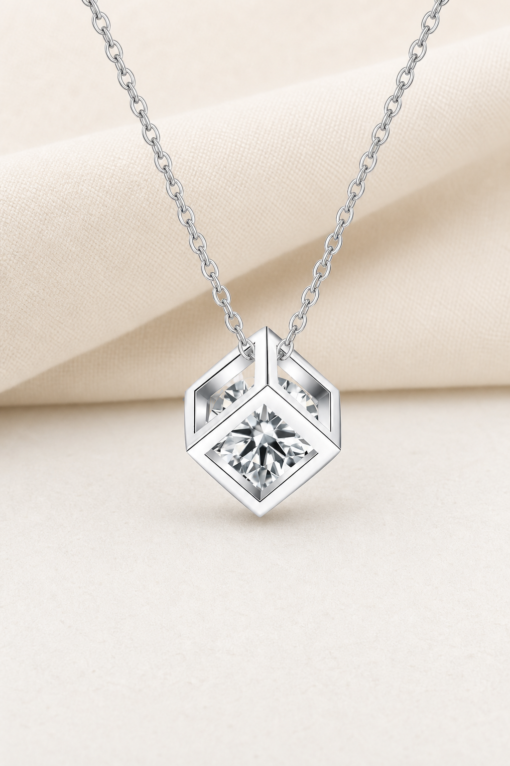 Impimo 1 CT Moissanite Square Cut Pendant - Hexagon & Cube - 925 Sterling Silver with 18K White Gold Plating | display view on ivory linen