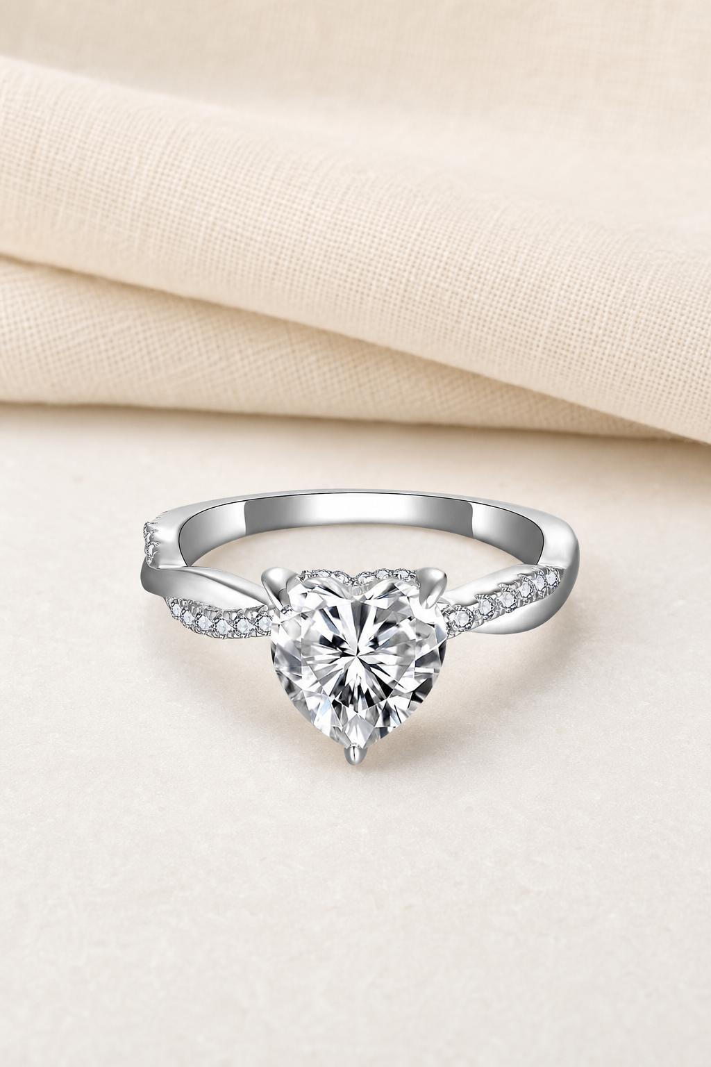 Impimo 2 CT Moissanite Multiple Shape Ring - 925 Sterling Silver with 18K White Gold Plating | display view on ivory linen - heart cut