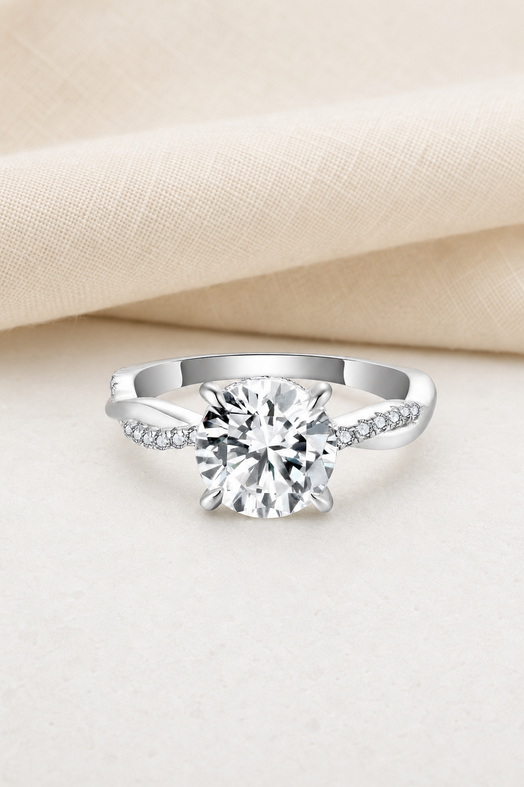Impimo 2 CT Moissanite Multiple Shape Ring - 925 Sterling Silver with 18K White Gold Plating | display view on ivory linen - round cut