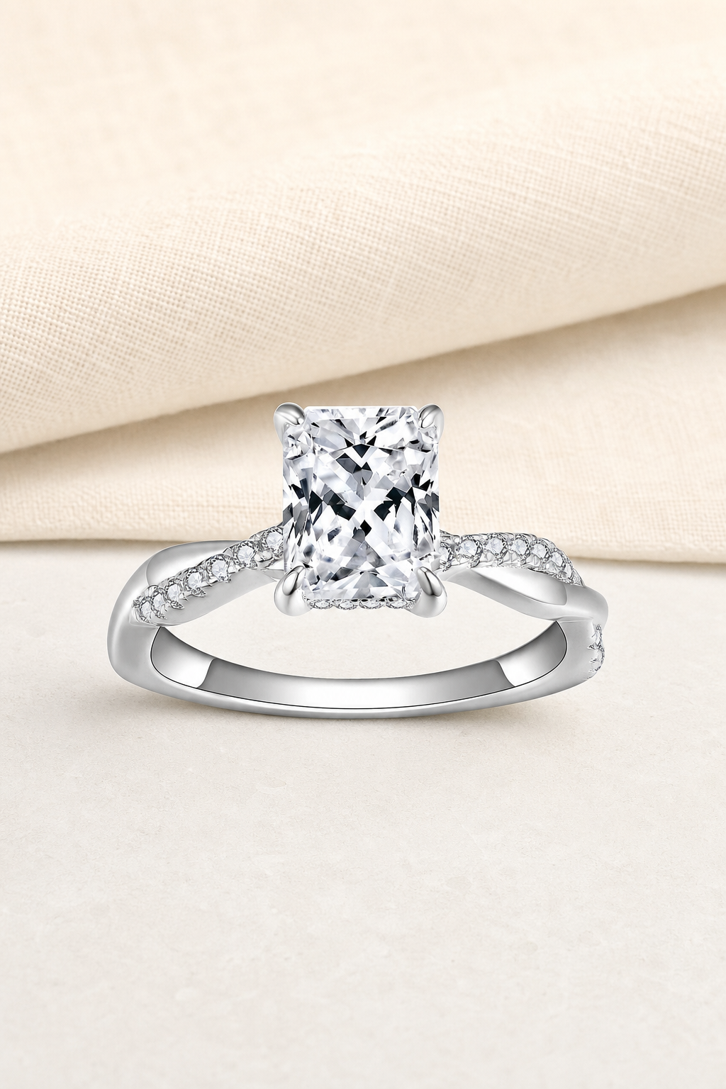 Impimo 2 CT Moissanite Multiple Shape Ring - 925 Sterling Silver with 18K White Gold Plating | display view on ivory linen - radiant cut