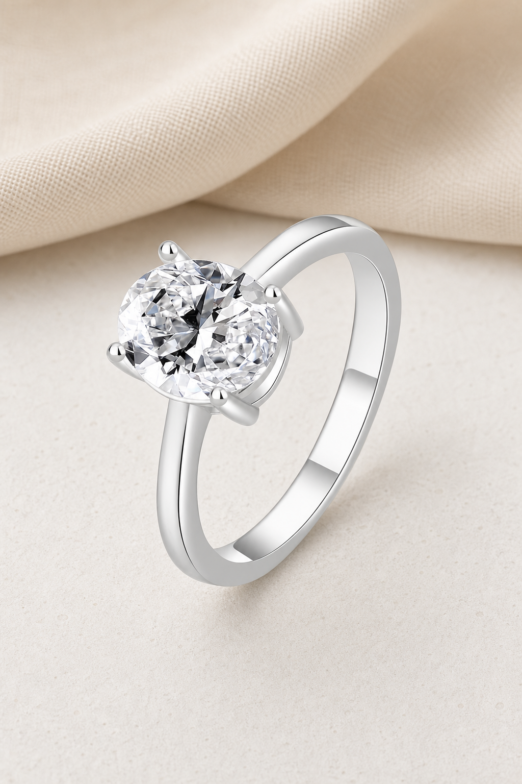 Impimo 1/2 CT Moissanite Multiple Shape Ring - 925 Sterling Silver with 18K White Gold Plating | display view on ivory linen - oval cut