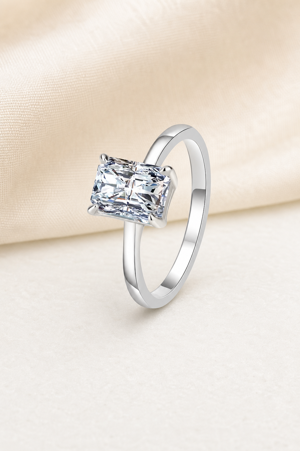 Impimo 1/2 CT Moissanite Multiple Shape Ring - 925 Sterling Silver with 18K White Gold Plating | display view on ivory linen - radiant cut