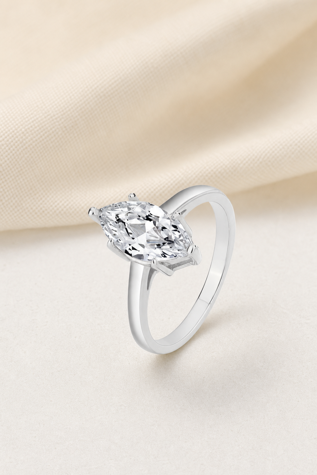 Impimo 1/2 CT Moissanite Multiple Shape Ring - 925 Sterling Silver with 18K White Gold Plating | display view on ivory linen - marquise cut