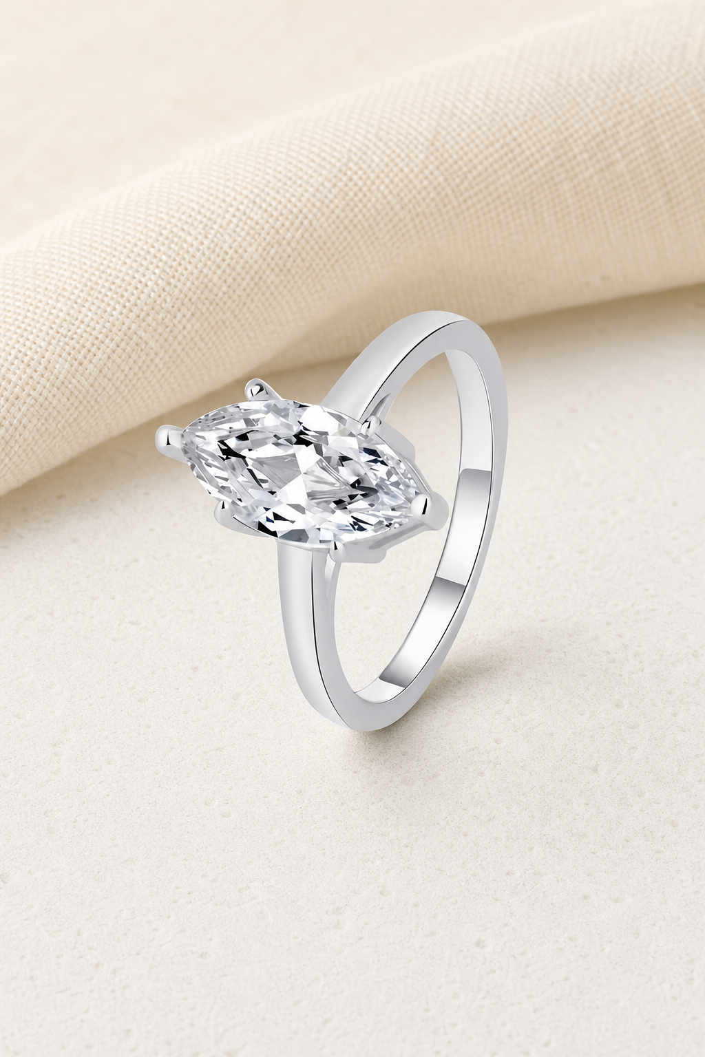 Impimo 1/2 CT Lab-Grown Diamond Ring - Radiant, Oval, Marquise & Pear Cut Options - 925 Sterling Silver with 18K White Gold Plating | display view on ivory linen - marquise cut