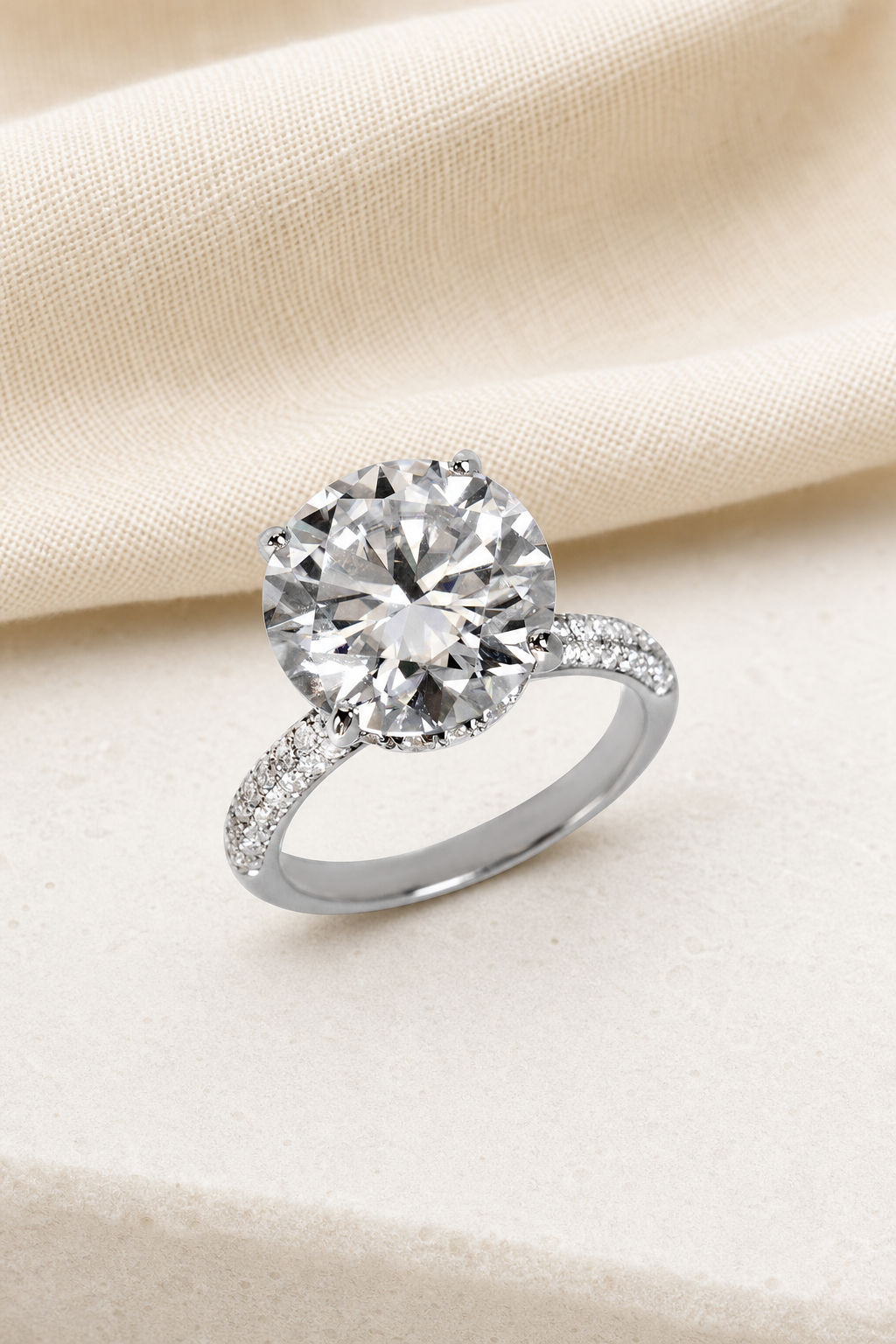 Impimo 10 CT Moissanite Round Cut Ring - Micro Pavé Solitaire - 925 Sterling Silver with 18K White Gold Plating | display view on ivory linen