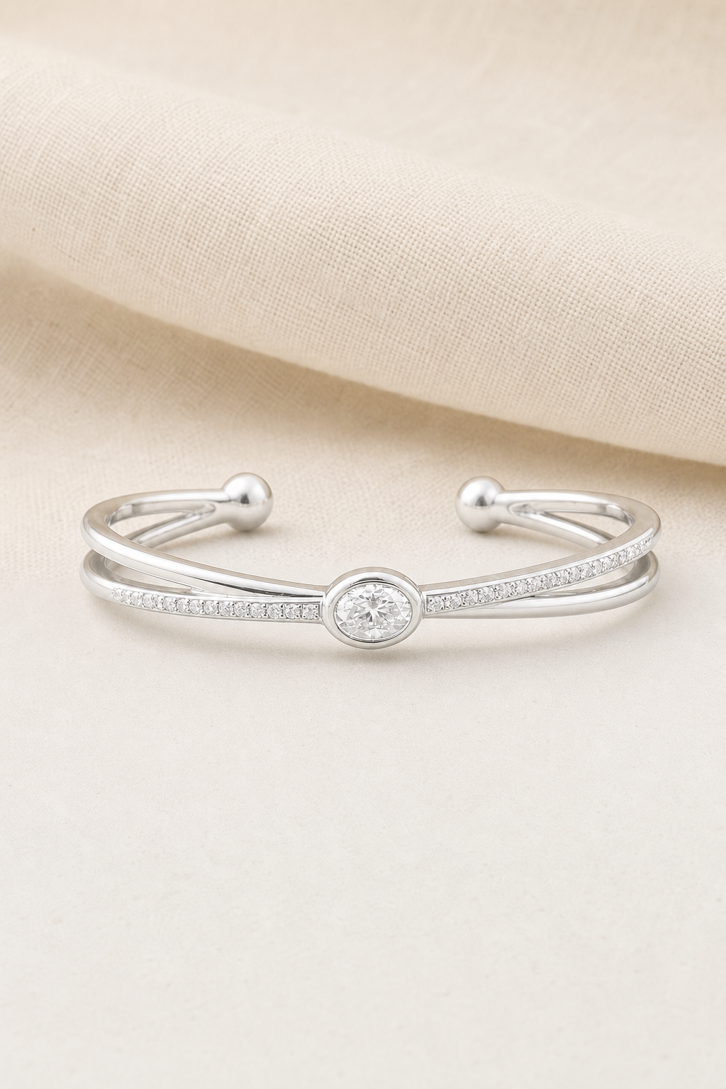 Impimo 1.60 CT Moissanite Bangle with Oval Center Stone - 925 Silver 18K White Gold | display view on ivory linen