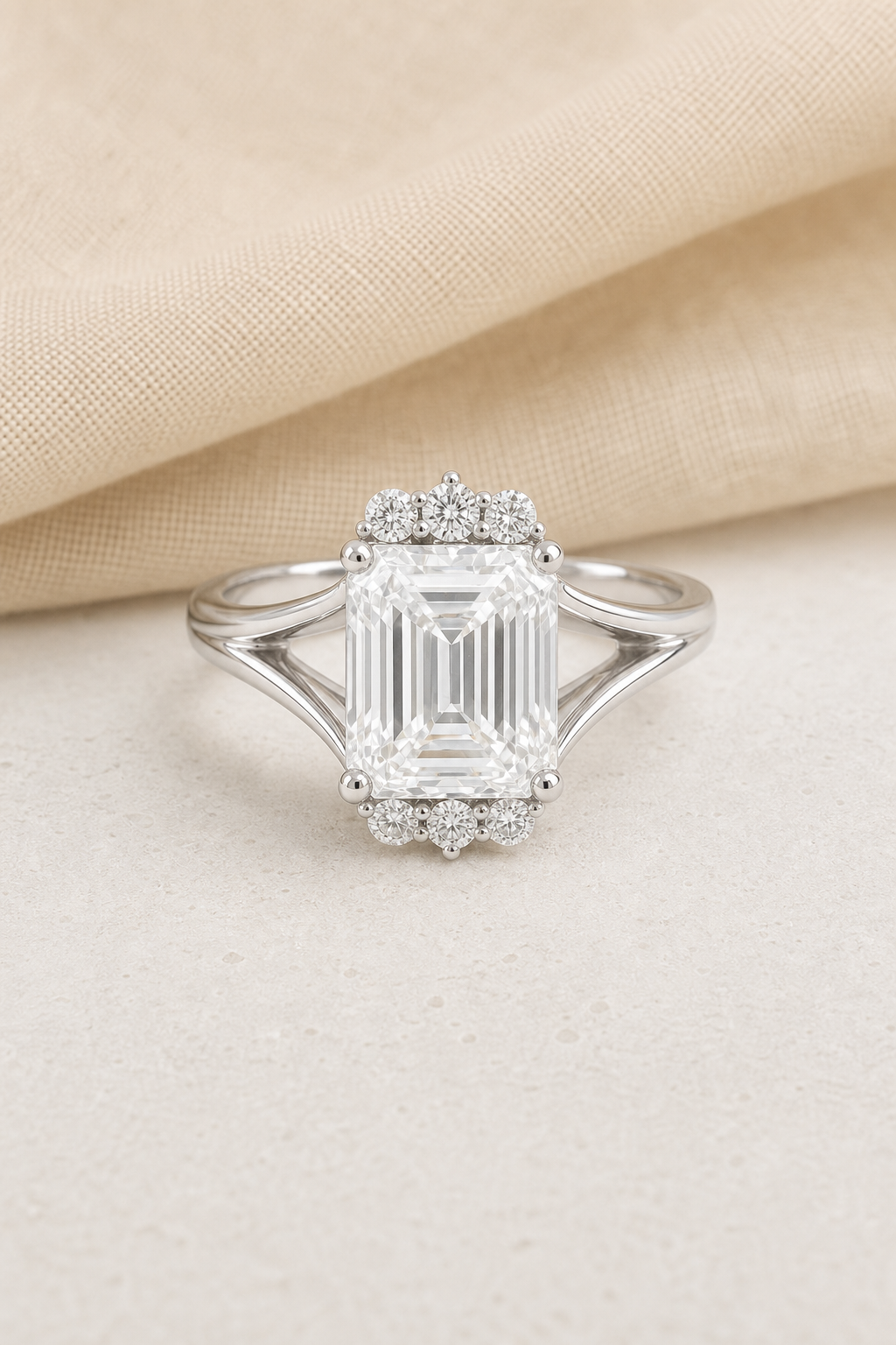 Impimo 3 CT Moissanite Emerald Cut Ring - 925 Sterling Silver with 18K White Gold Plating | display view on ivory linen