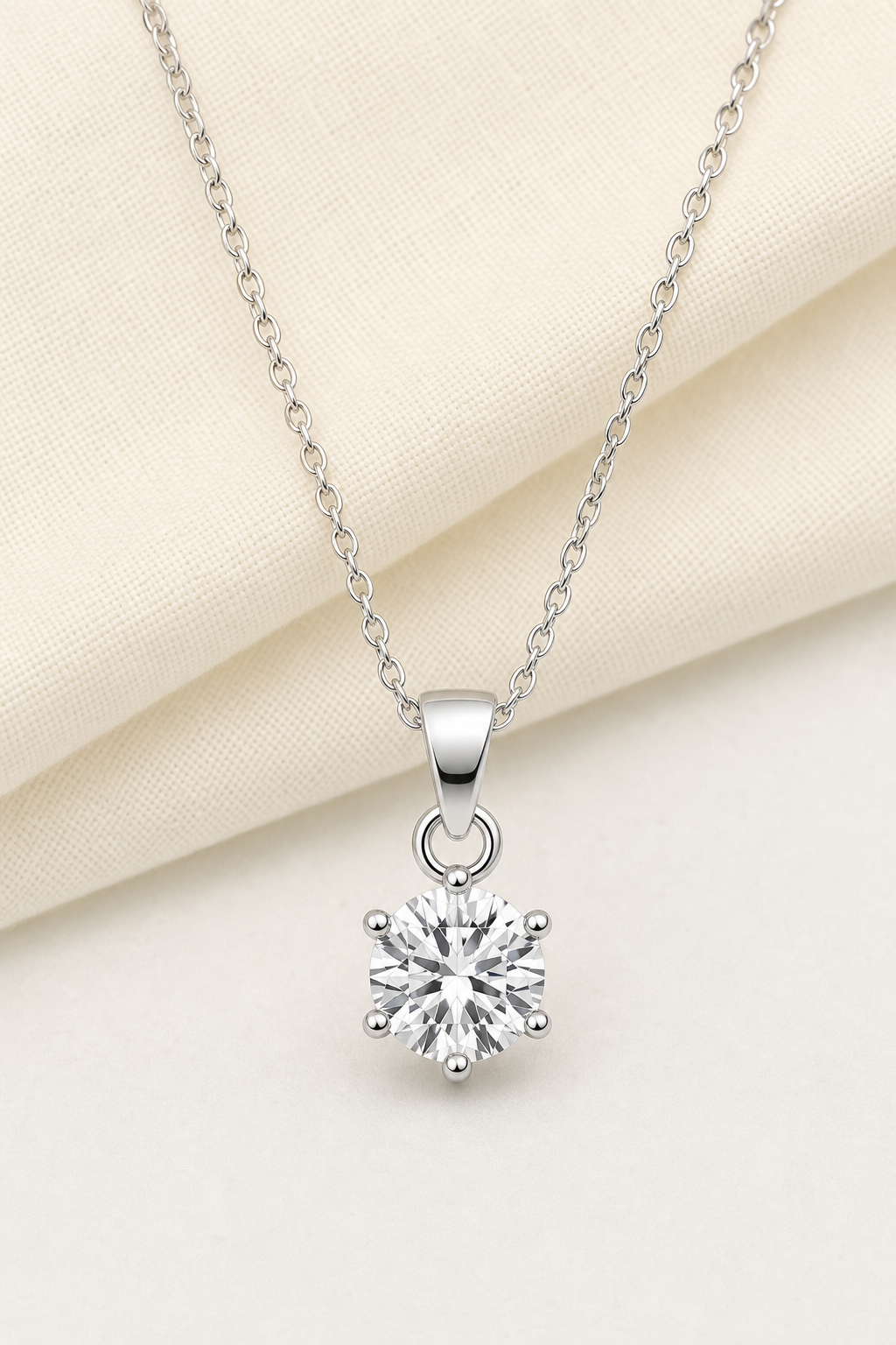 Impimo 1/2/3/5 CT Moissanite Round Cut Pendant - 925 Sterling Silver with 18K White Gold Plating | display view on ivory linen