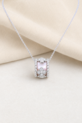 Impimo Natural Pink Mother of Pearl & Moissanite Flower Motif Slider Pendant - 925 Sterling Silver with 18K White Gold Plating | display view on ivory linen