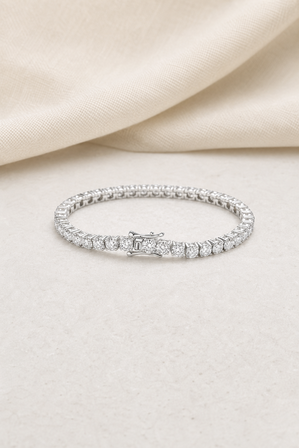 Impimo Moissanite Over 5 CT Round Cut Tennis Bracelet - 925 Sterling Silver (0.10 CT Per Stone) | display view on ivory linen