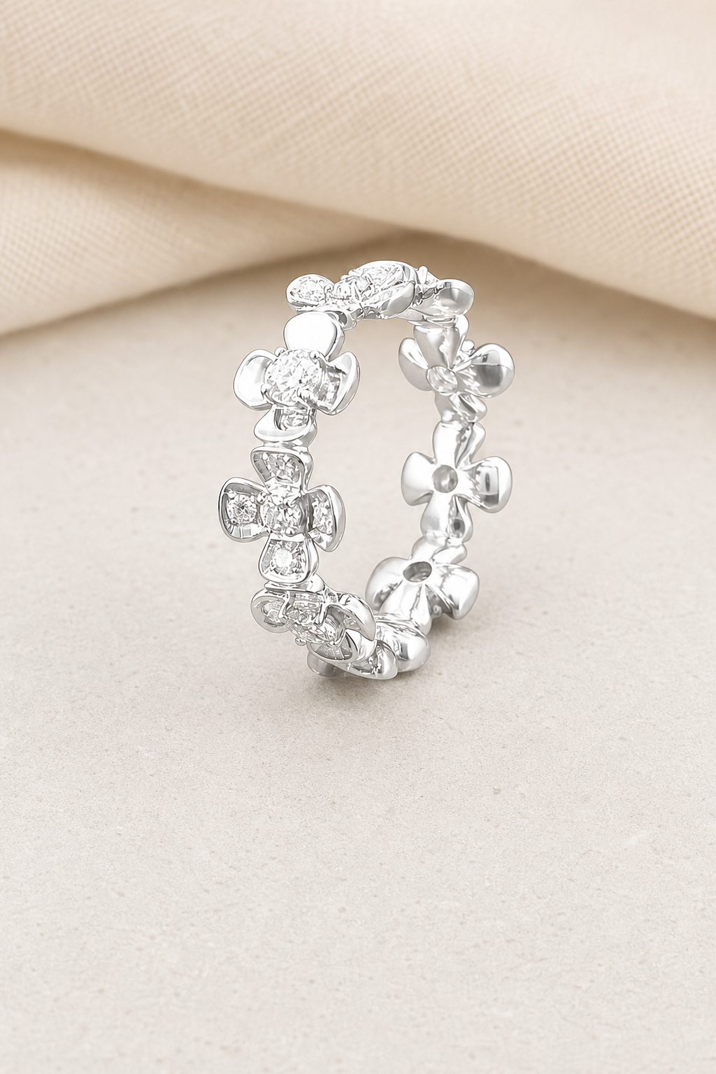 Impimo 1 CT Moissanite Floral Eternity Band Ring - 925 Silver 18K White Gold | display view on ivory linen