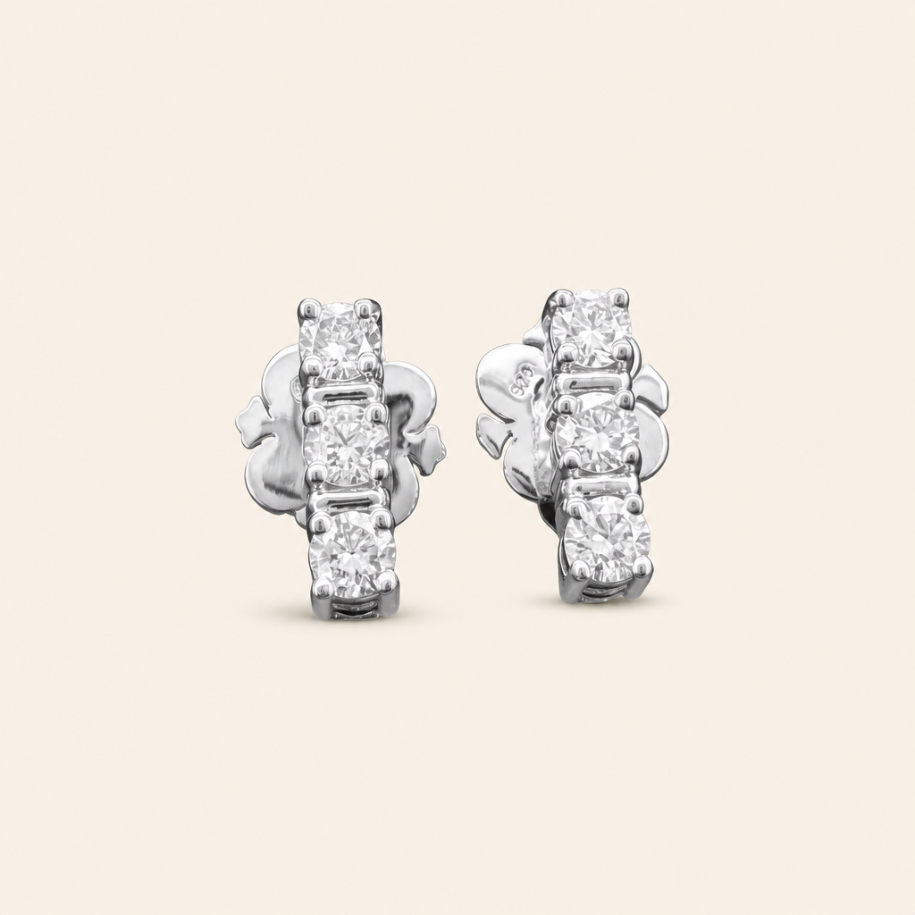 Impimo 0.7 CT (Pair) Lab-Grown Diamond Round Cut Earrings - 925 Sterling Silver with 18K White Gold Plating | packshot on ivory