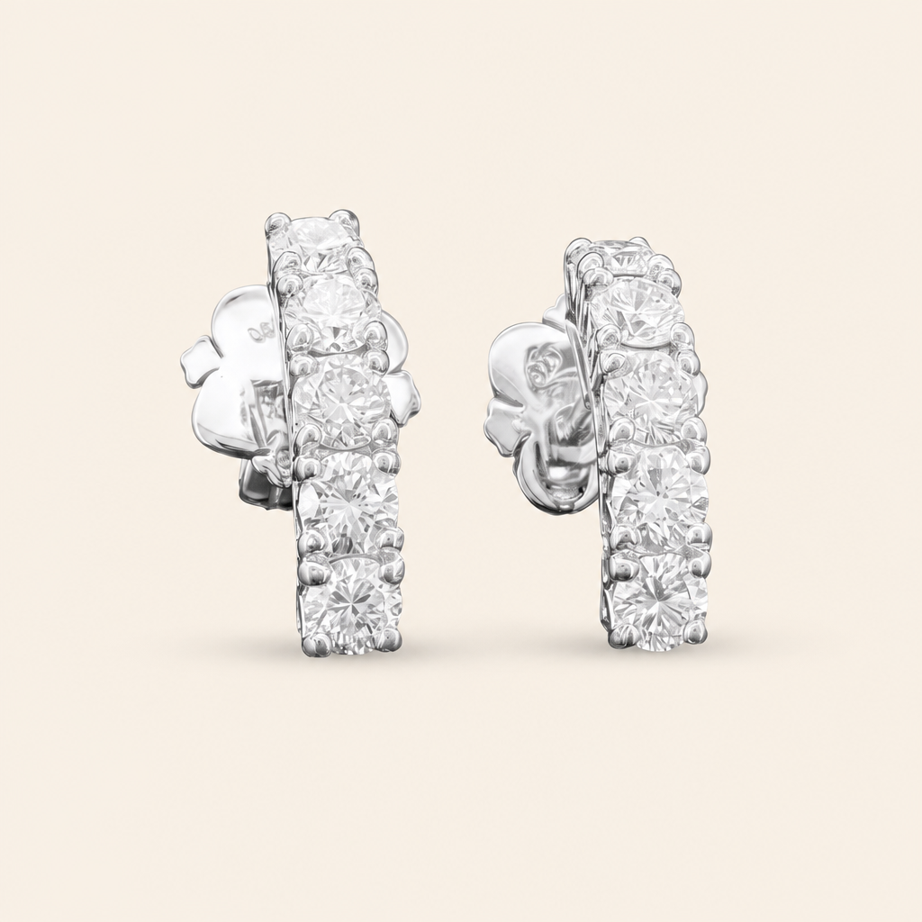 Impimo 1.1 CT (Pair) Lab-Grown Diamond Round Cut Earrings - 925 Sterling Silver with 18K White Gold Plating | packshot on ivory