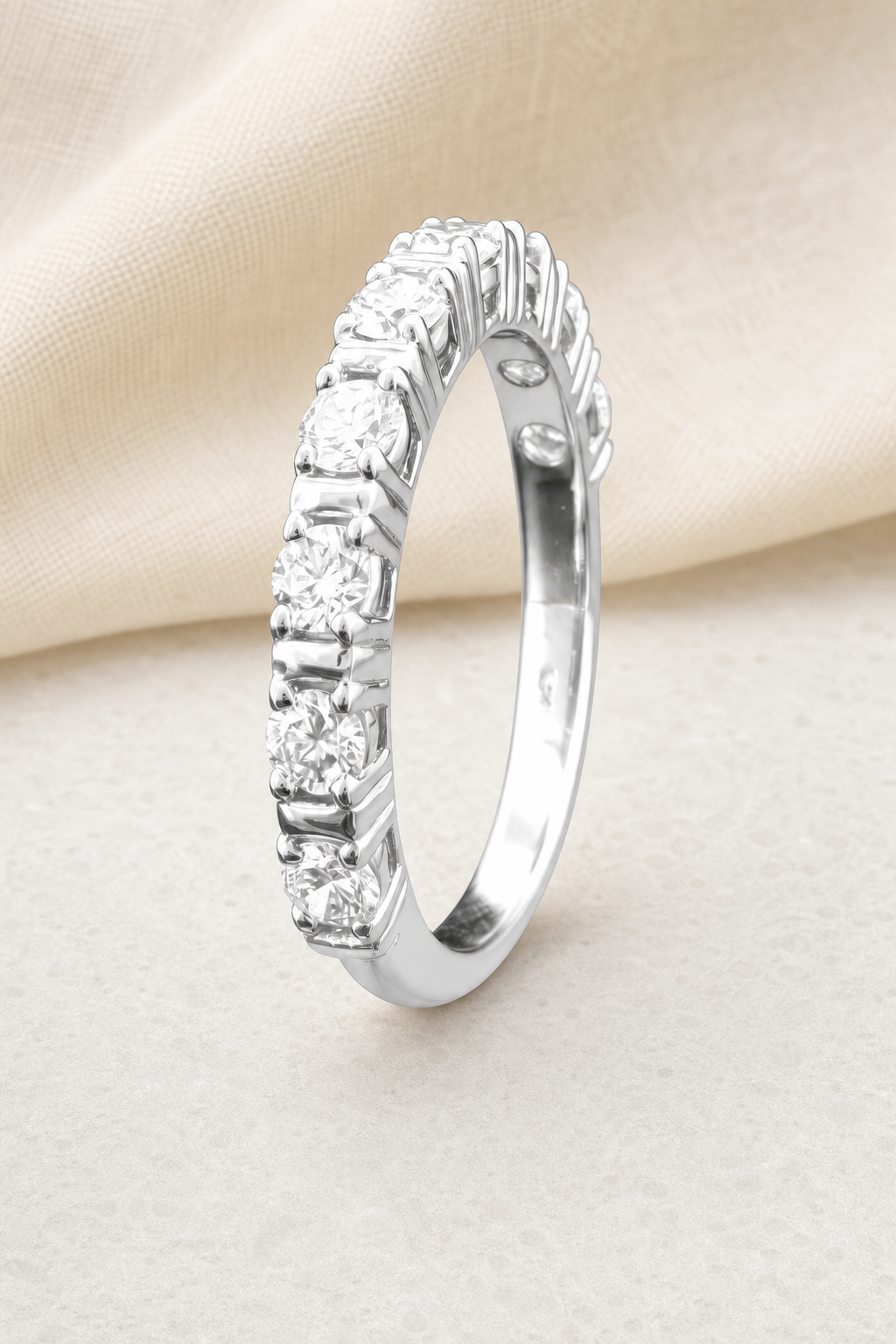 Impimo 0.9 CT Lab-Grown Diamond Round Cut Ring - Prong-Set Eternity Band - 925 Sterling Silver with 18K White Gold Plating | display view on ivory linen