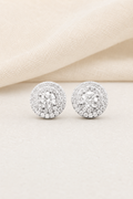 Impimo 0.55/1 CT (Pair) Moissanite Round Cut Earrings - 925 Sterling Silver with 18K White Gold Plating | display view on ivory linen