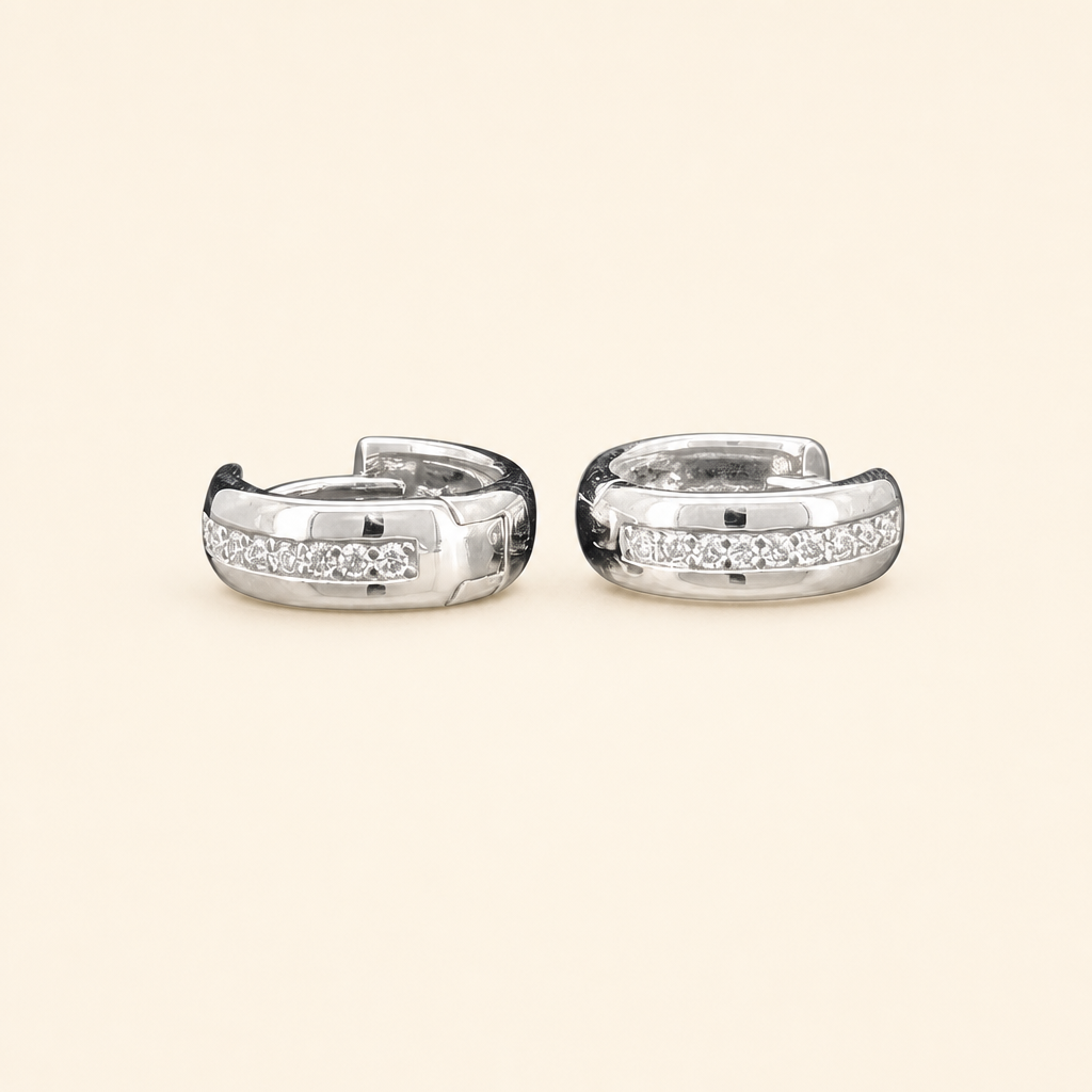 Impimo 0.2 CT (Pair) Moissanite Round Cut Earrings - 925 Sterling Silver with 18K White Gold Plating | packshot on ivory