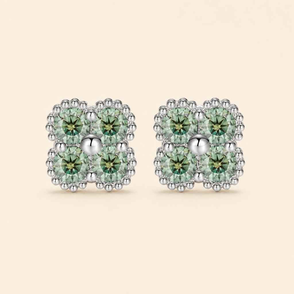 Impimo Fancy Green Moissanite Four-Leaf Clover Jewelry Set - Pendant, Bracelet & Earrings | packshot on ivory